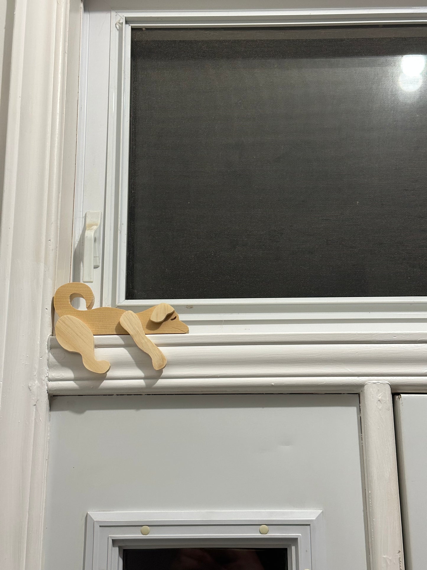 Door Frame Dog